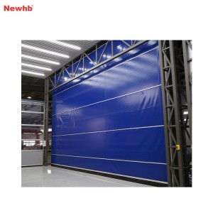 Vertical lifting fabric door